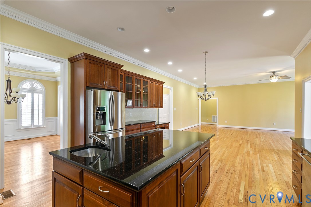 630 Cross Ridge Lane Manakin-Sabot, VA 23103 - Photo 15 of 48 a kitchen with stainless steel appliances granite countertop a sink and a refrigerator