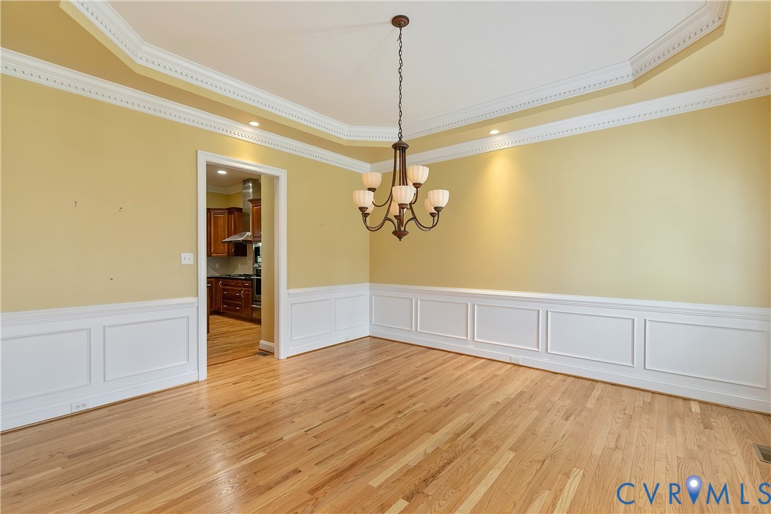 630 Cross Ridge Lane Manakin-Sabot, VA 23103 - Photo 16 of 48 a view of a kitchen with wooden floor and a ceiling fan