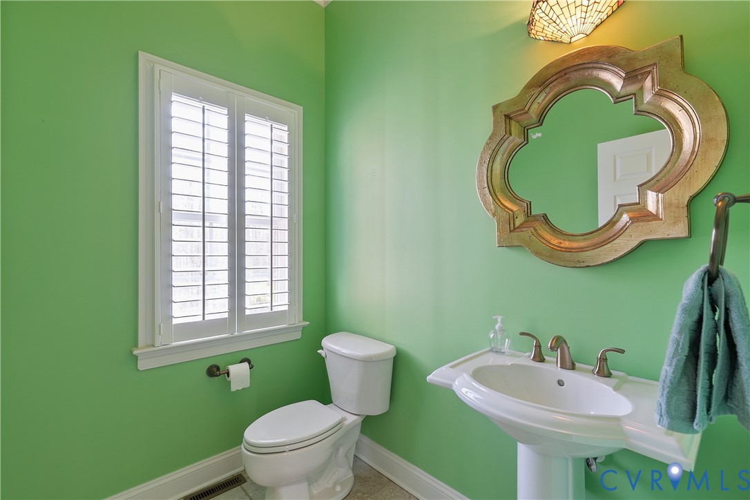 630 Cross Ridge Lane Manakin-Sabot, VA 23103 - Photo 19 of 48 a bathroom with a sink and mirror
