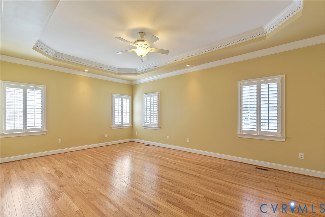 630 Cross Ridge Lane Manakin-Sabot, VA 23103 - Photo 20 of 48 a view of an empty room with a window and wooden floor