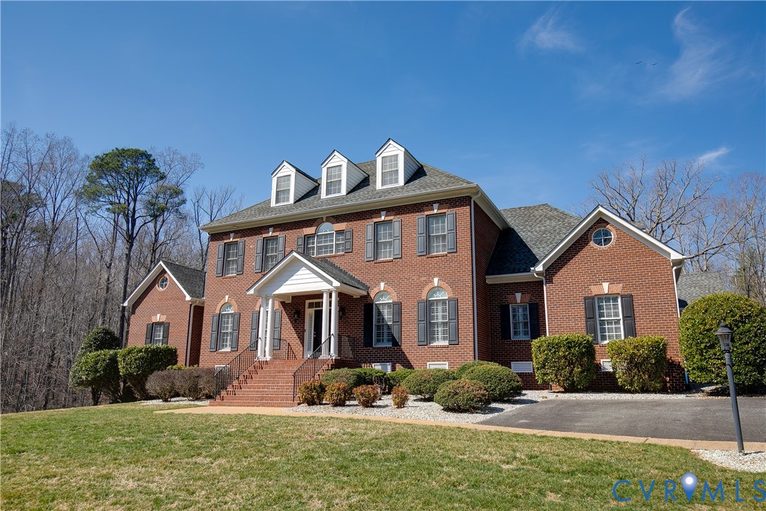 630 Cross Ridge Lane Manakin-Sabot, VA 23103 - Photo 2 of 48 a front view of a house with garden
