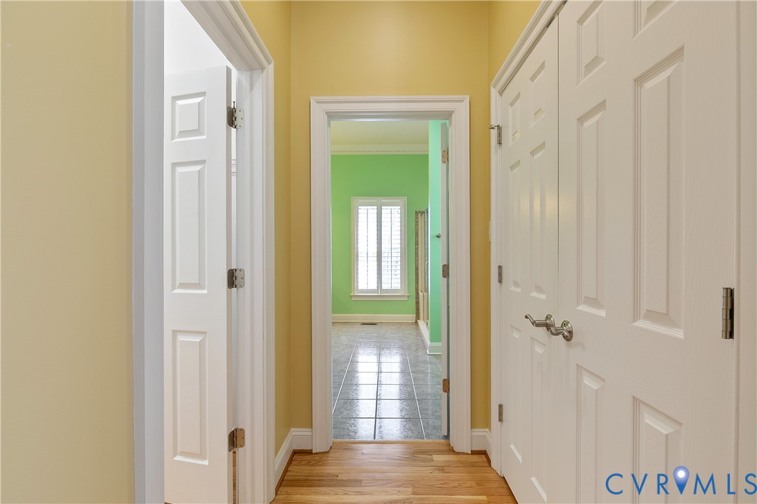 630 Cross Ridge Lane Manakin-Sabot, VA 23103 - Photo 22 of 48 view of a hallway with wooden floor and a door