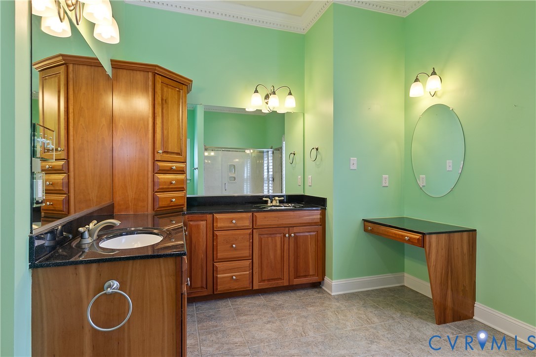 630 Cross Ridge Lane Manakin-Sabot, VA 23103 - Photo 23 of 48 a bathroom with a sink and a mirror