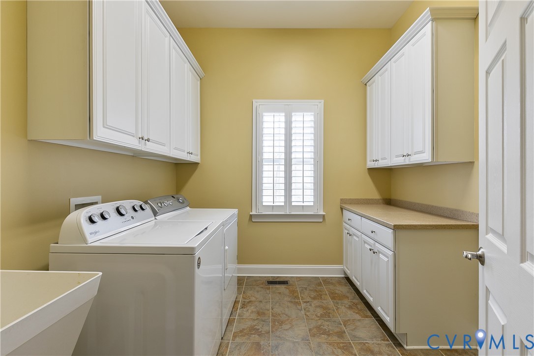 630 Cross Ridge Lane Manakin-Sabot, VA 23103 - Photo 27 of 48 a utility room with dryer and washer