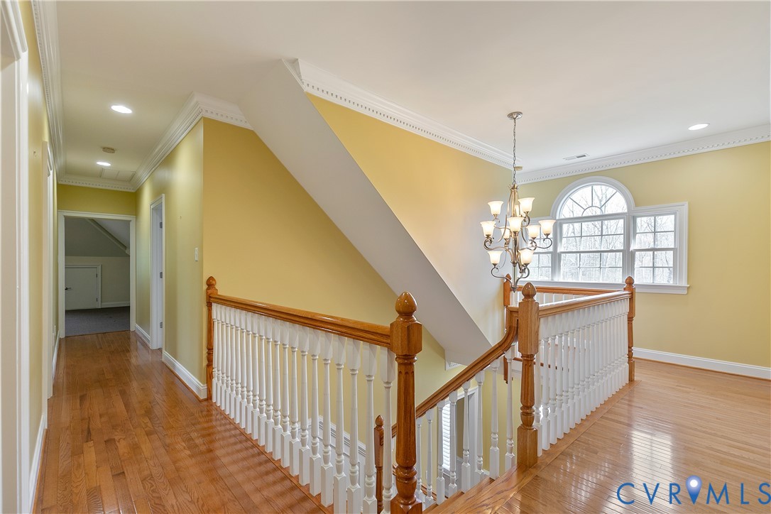 630 Cross Ridge Lane Manakin-Sabot, VA 23103 - Photo 29 of 48 a view of a hallway with chandelier