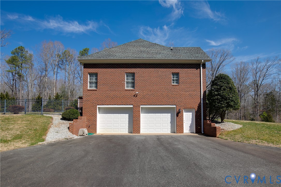 630 Cross Ridge Lane Manakin-Sabot, VA 23103 - Photo 4 of 48 a front view of a house with a yard