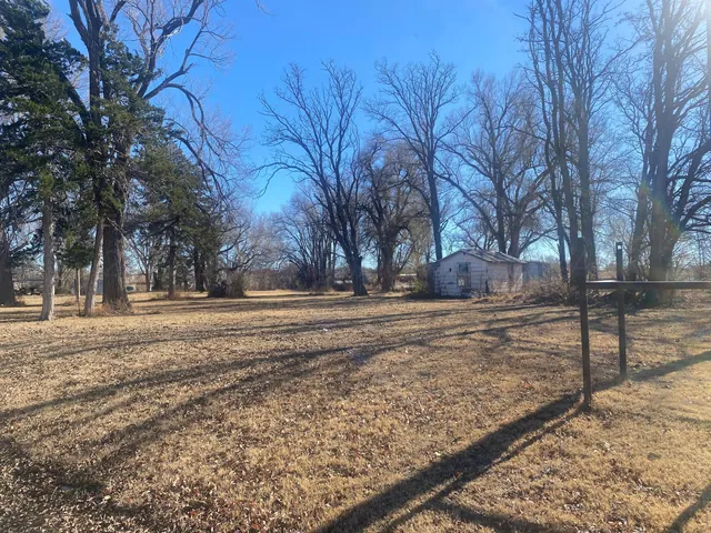 a view of snow on the side of the road
