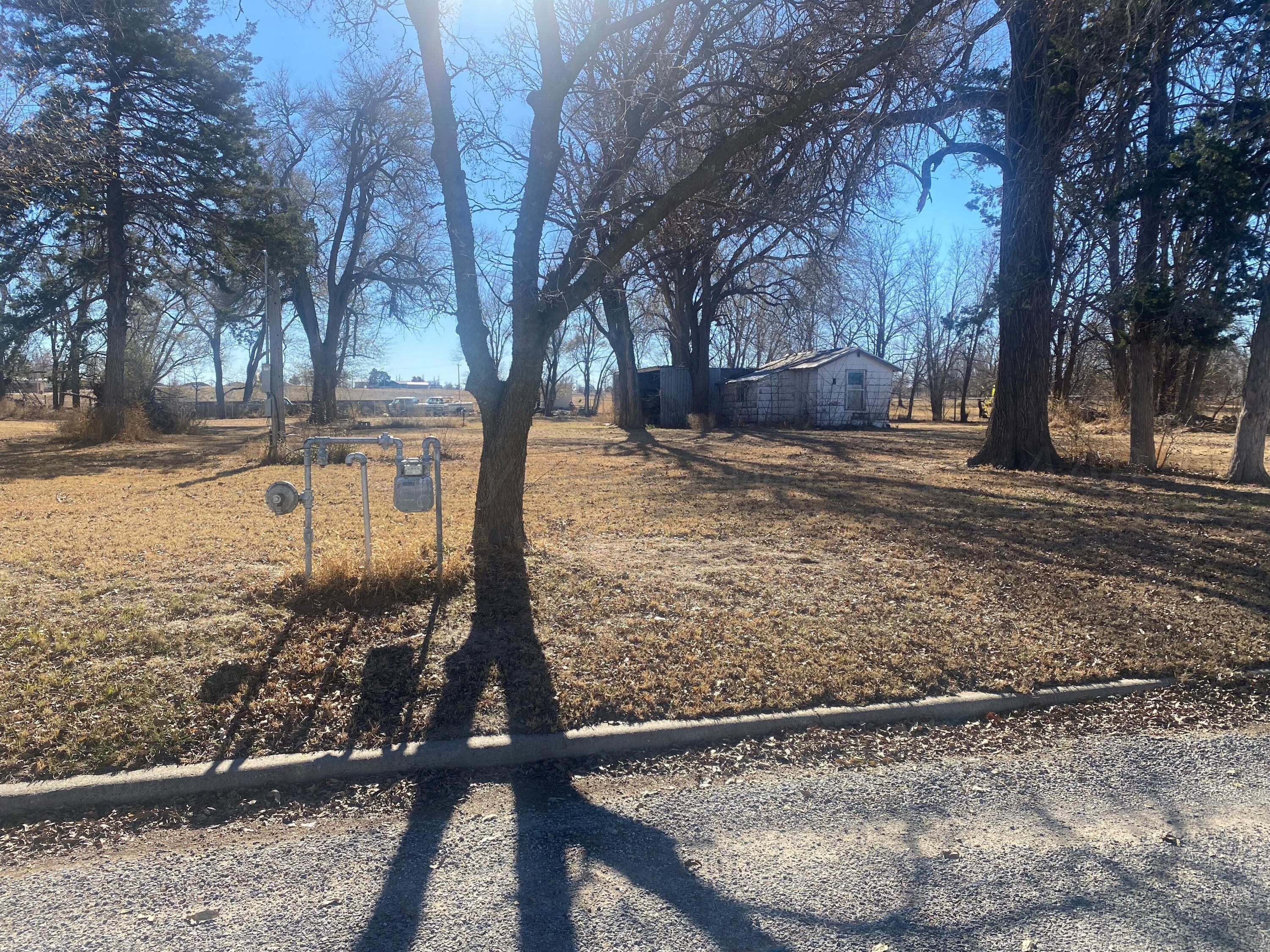 409 West 7th Street Wheeler, TX 79096 - Photo 3 of 4 a view of a yard covered with snow