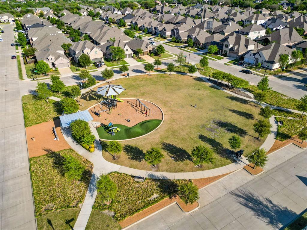 1501 Snowdrop Drive Prosper, TX 75078 - Photo 27 of 27 an aerial view of a swimming pool