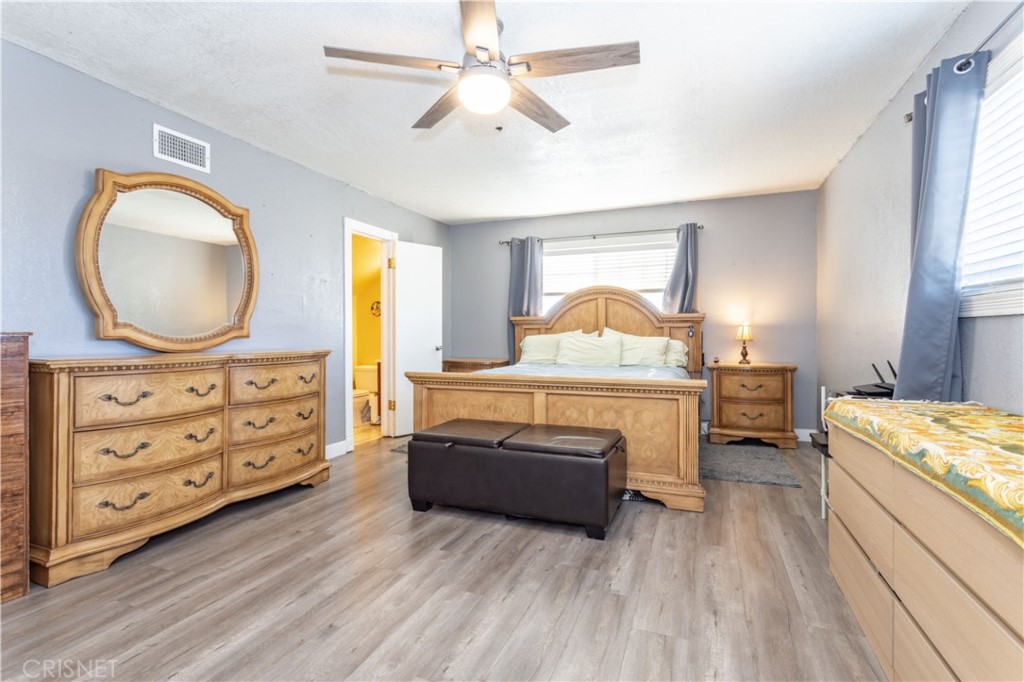 9021 Oneida Avenue Sun Valley, CA 91352 - Photo 16 of 36 a bedroom with a bed and a dresser