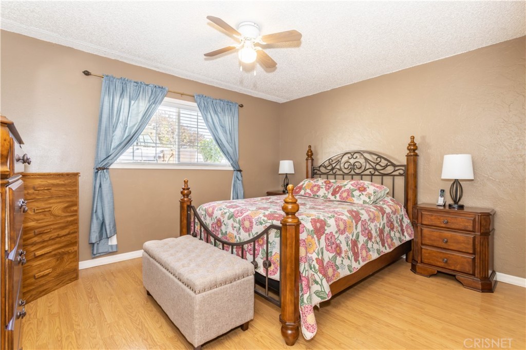 9021 Oneida Avenue Sun Valley, CA 91352 - Photo 2 of 36 a bedroom with a bed and window