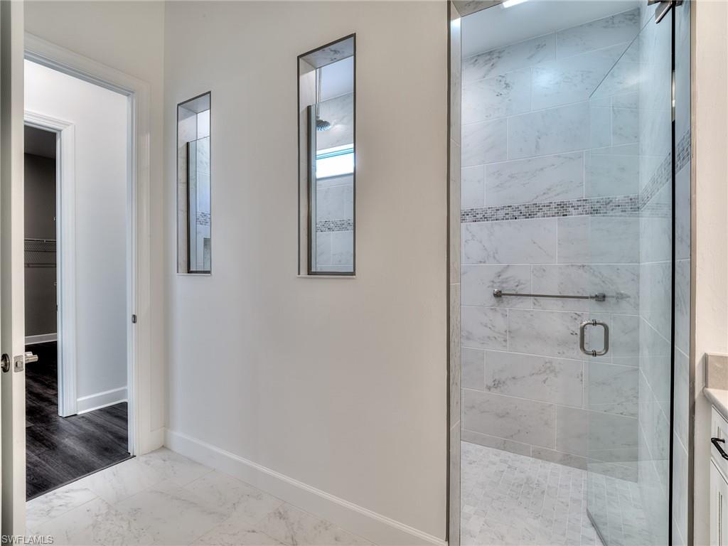 1987 Don Benito Way Naples, FL 34120 - Photo 11 of 22 Photo is from a furnished model. Options for this home may vary.