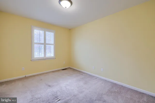 an empty room with an entryway