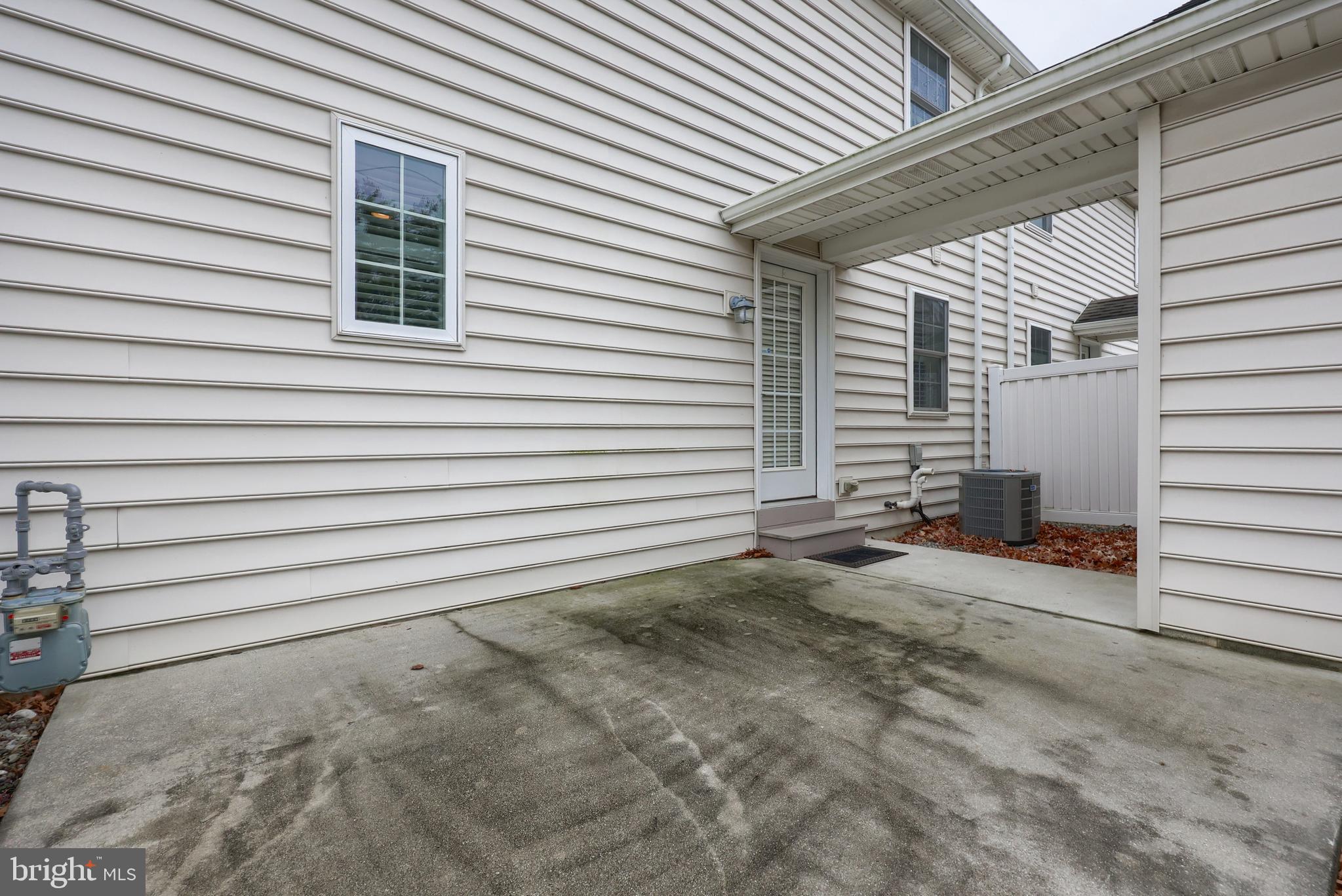 120 Baneberry Lane Lititz, PA 17543 - Photo 32 of 36 a view of a house with backyard and a garage