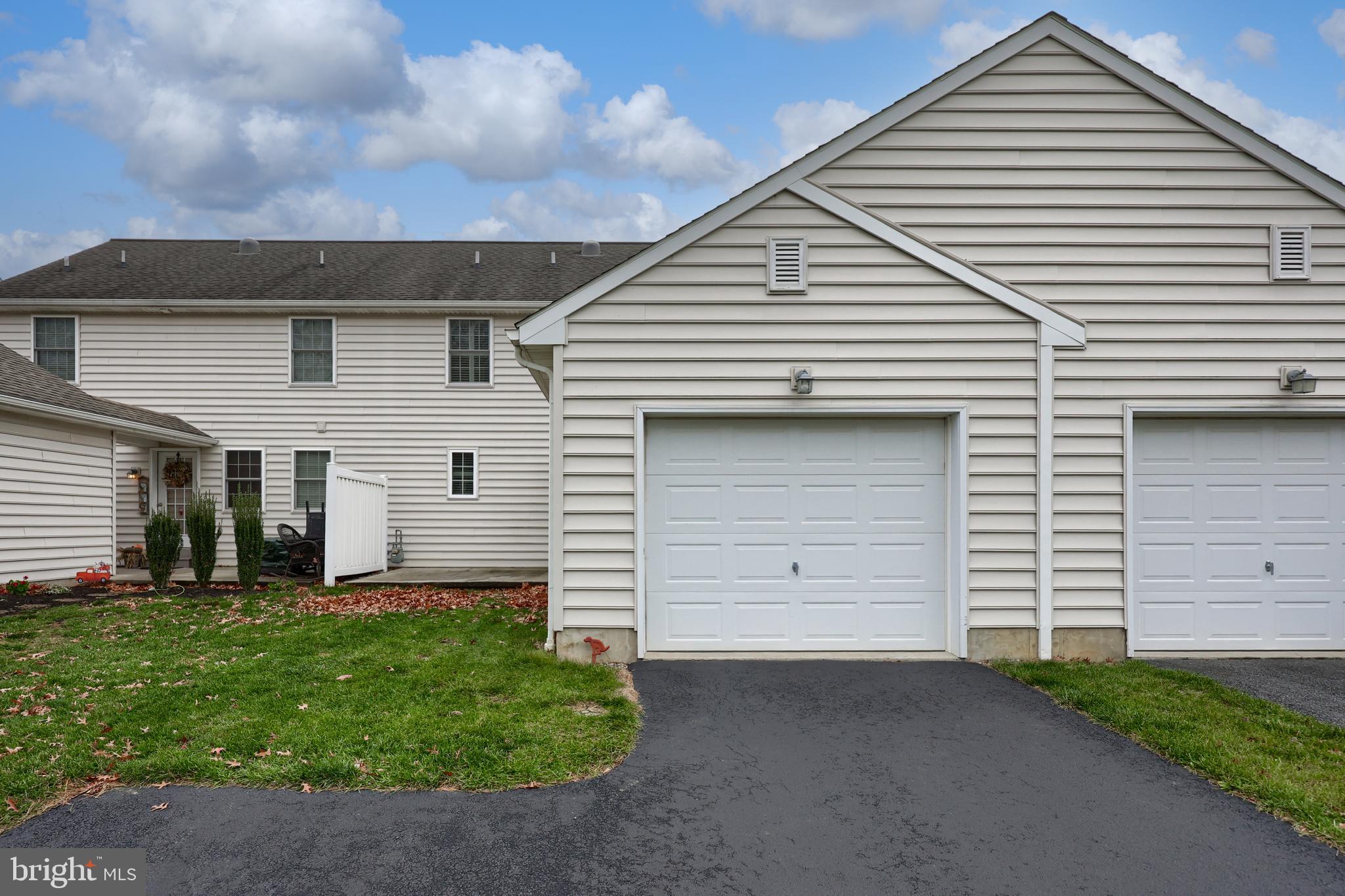 120 Baneberry Lane Lititz, PA 17543 - Photo 35 of 36 a front view of a house with a yard and garage
