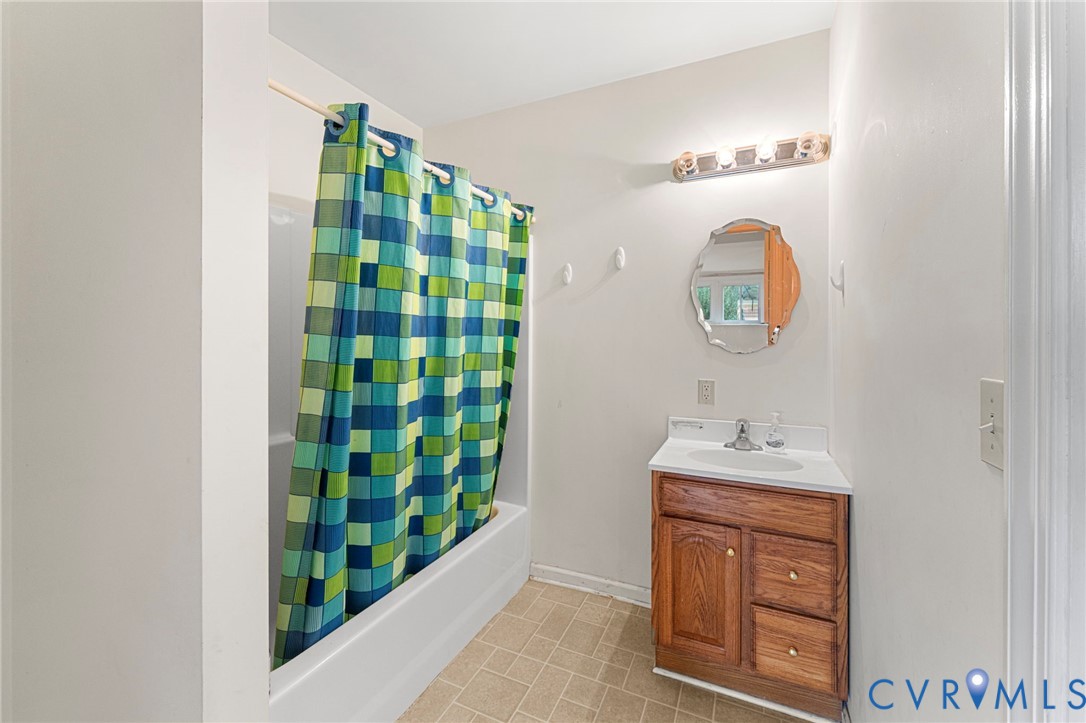 4516 Oldhams Road Hague, VA 22469 - Photo 14 of 23 a view of bathroom with dual sinks