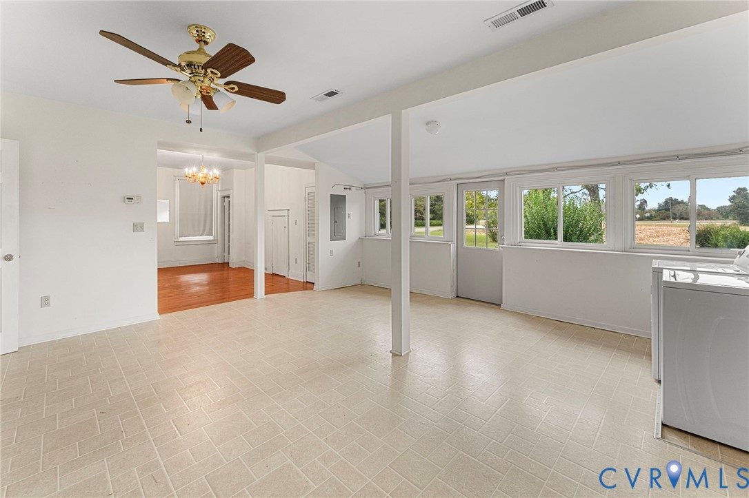 4516 Oldhams Road Hague, VA 22469 - Photo 9 of 23 a view of an empty room with a window