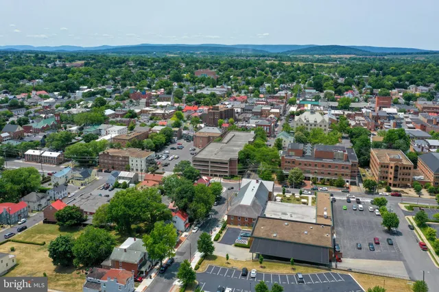 an aerial view of a city with lots of residential buildings