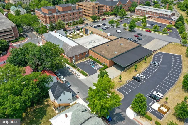 an aerial view of a house with a garden