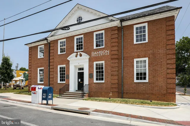 a view of a building along a street