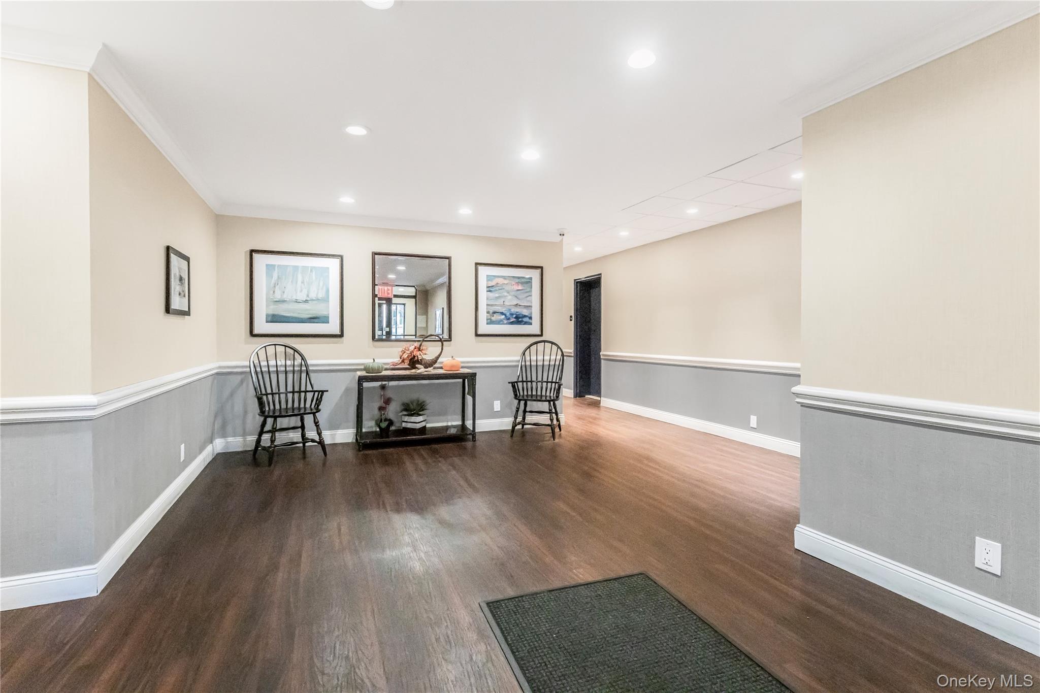 640 Pelham Road, Unit 3L New Rochelle, NY 10805 - Photo 13 of 20 a living room with furniture and a wooden floor