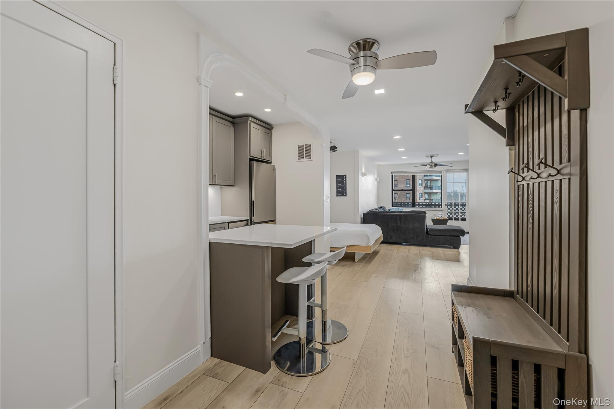 640 Pelham Road, Unit 3L New Rochelle, NY 10805 - Photo 2 of 20 a kitchen with a refrigerator a sink and cabinets