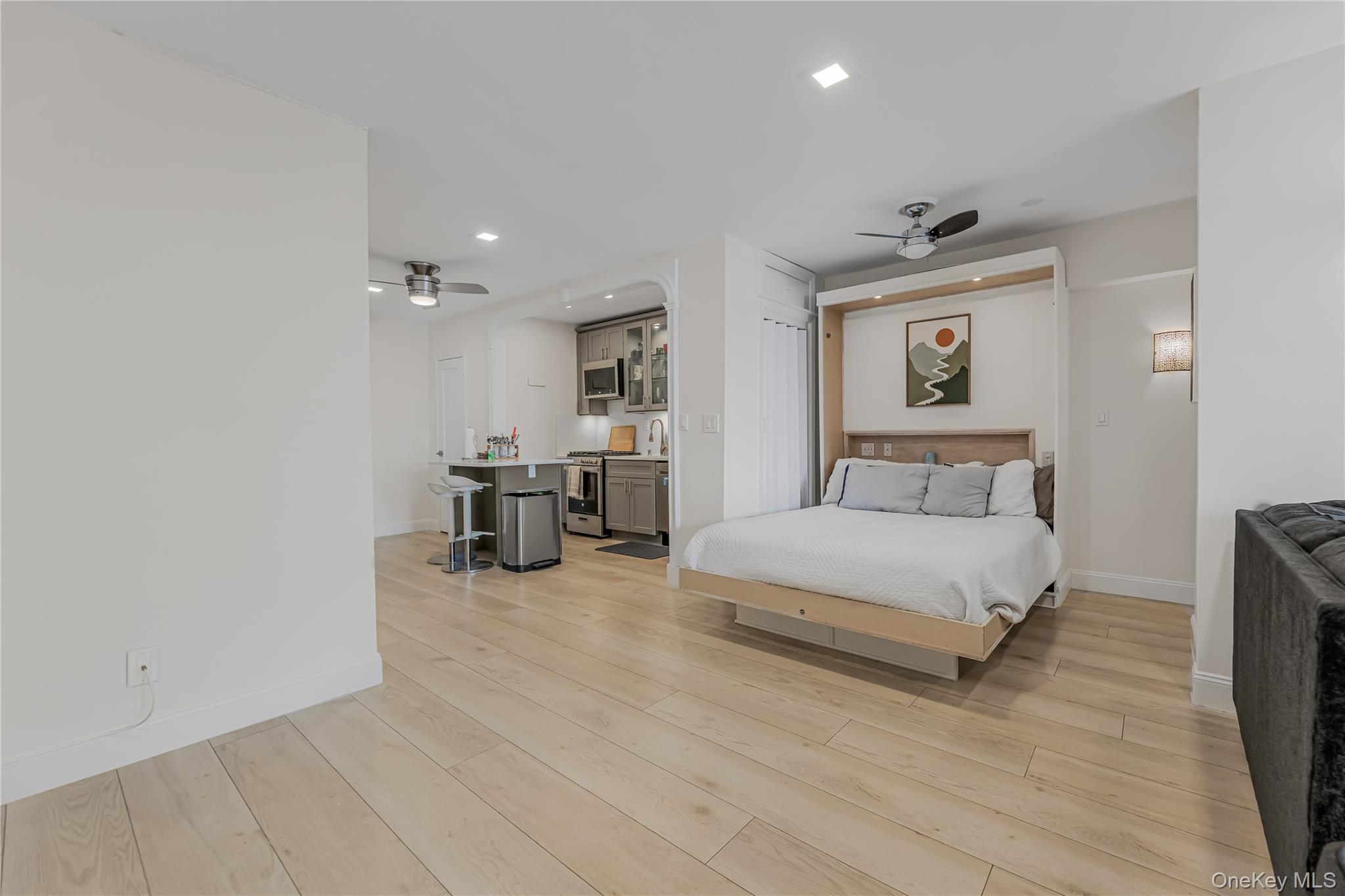 640 Pelham Road, Unit 3L New Rochelle, NY 10805 - Photo 6 of 20 a bedroom with a bed and furniture