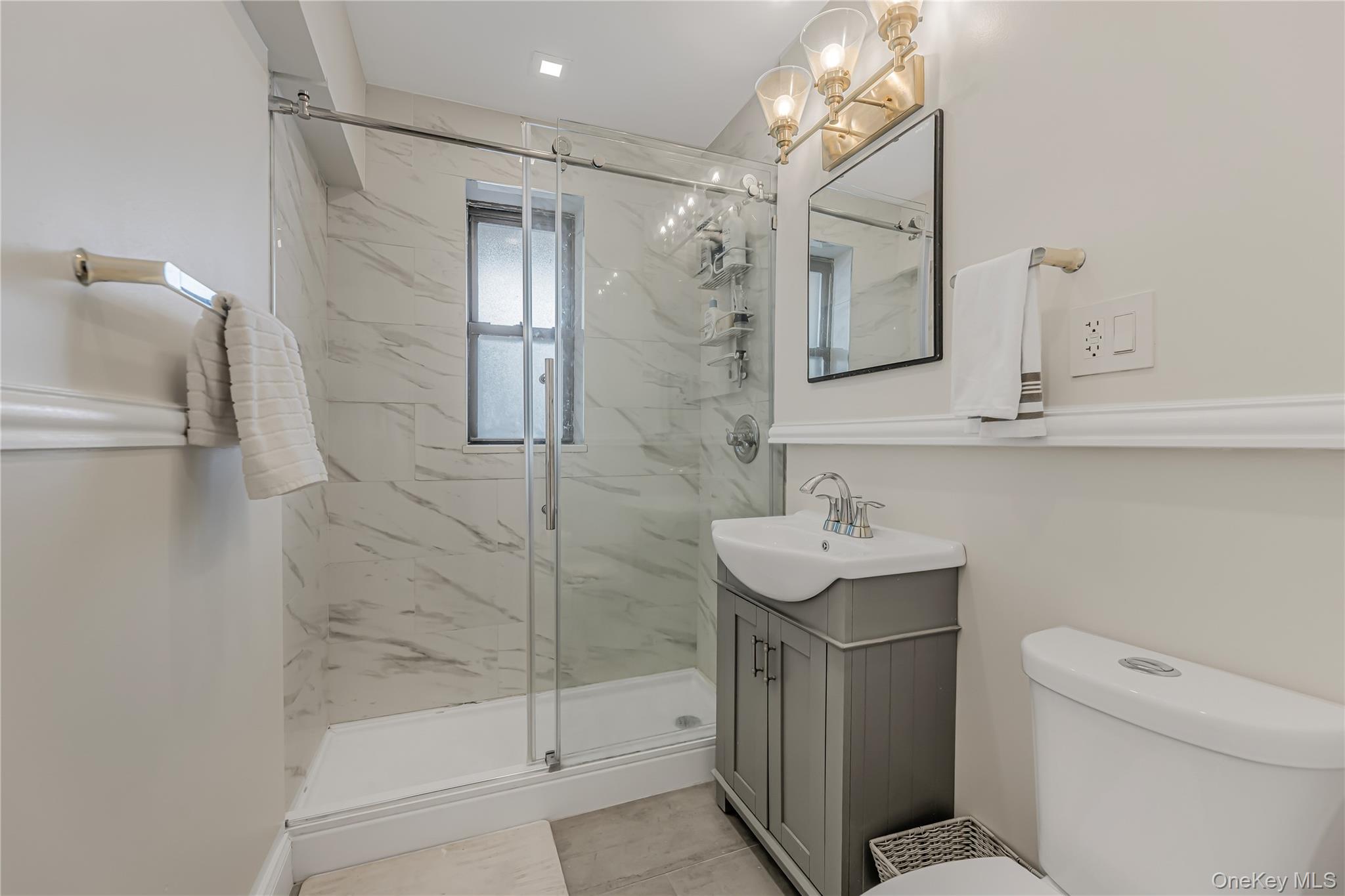 640 Pelham Road, Unit 3L New Rochelle, NY 10805 - Photo 9 of 20 a bathroom with a sink toilet and shower