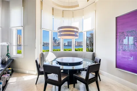 a kitchen with a sink cabinets and stainless steel appliances