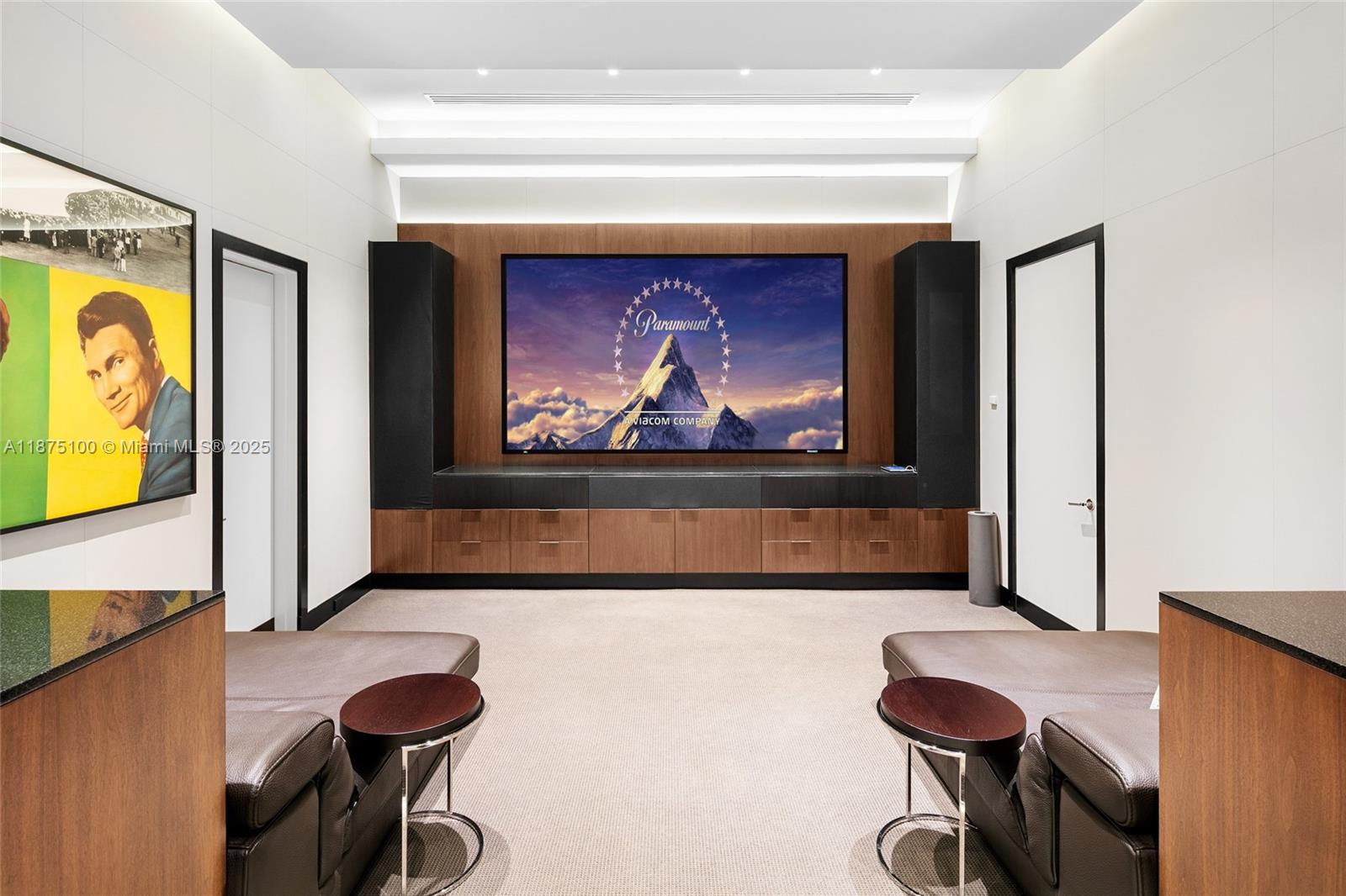 4042 Island Estates Drive Aventura, FL 33160 - Photo 36 of 46 a living room with couches and a flat screen tv