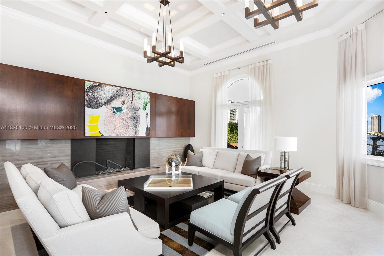 4042 Island Estates Drive Aventura, FL 33160 - Photo 7 of 46 a living room with furniture and a chandelier