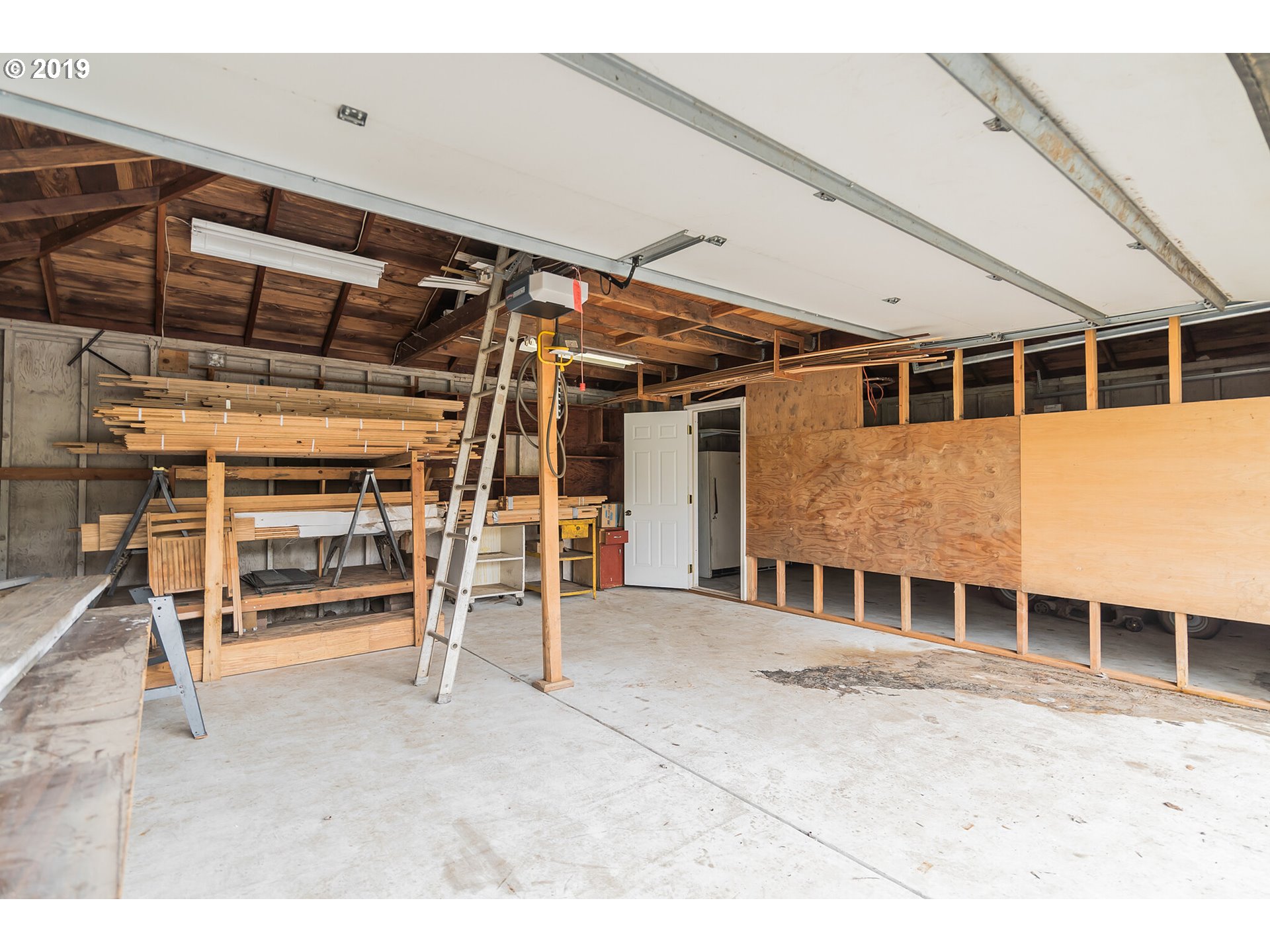 12929 Southeast Rusk Road Milwaukie, OR 97222 - Photo 29 of 32 a view of a big room with wooden walls