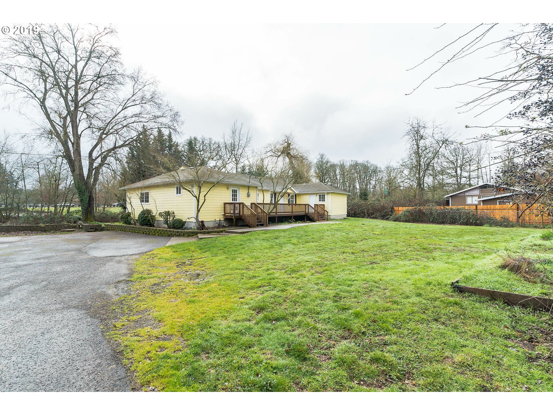 12929 Southeast Rusk Road Milwaukie, OR 97222 - Photo 4 of 32 a view of yard with swimming pool and green space