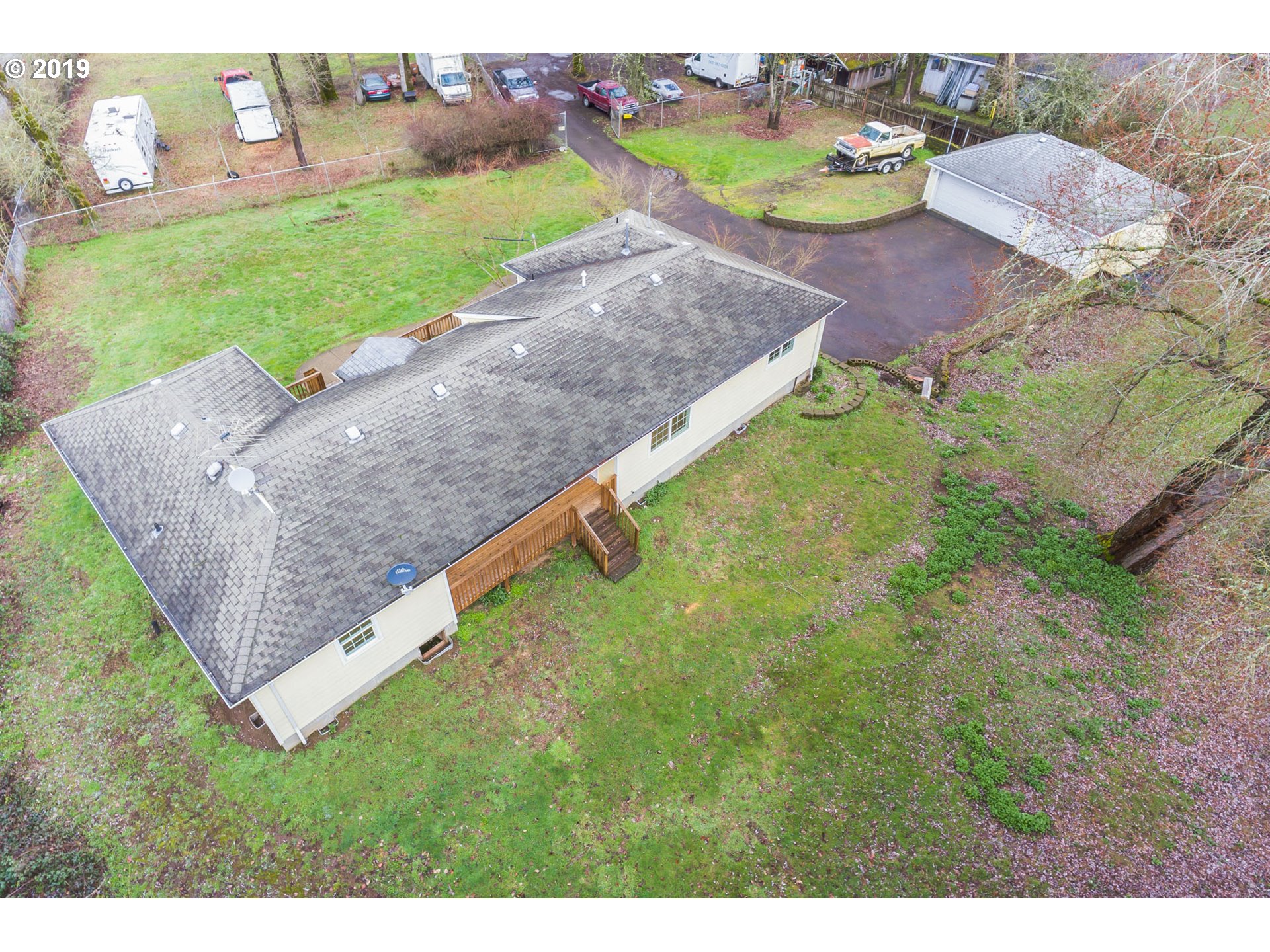 12929 Southeast Rusk Road Milwaukie, OR 97222 - Photo 6 of 32 a view of a backyard with outdoor space