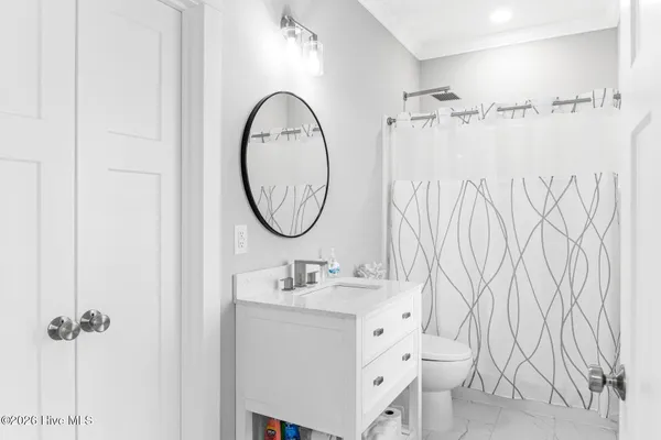 $899,900 | 367 Spicer Lake Drive, Holly Ridge, NC 28445