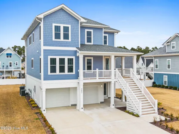 $899,900 | 367 Spicer Lake Drive, Holly Ridge, NC 28445