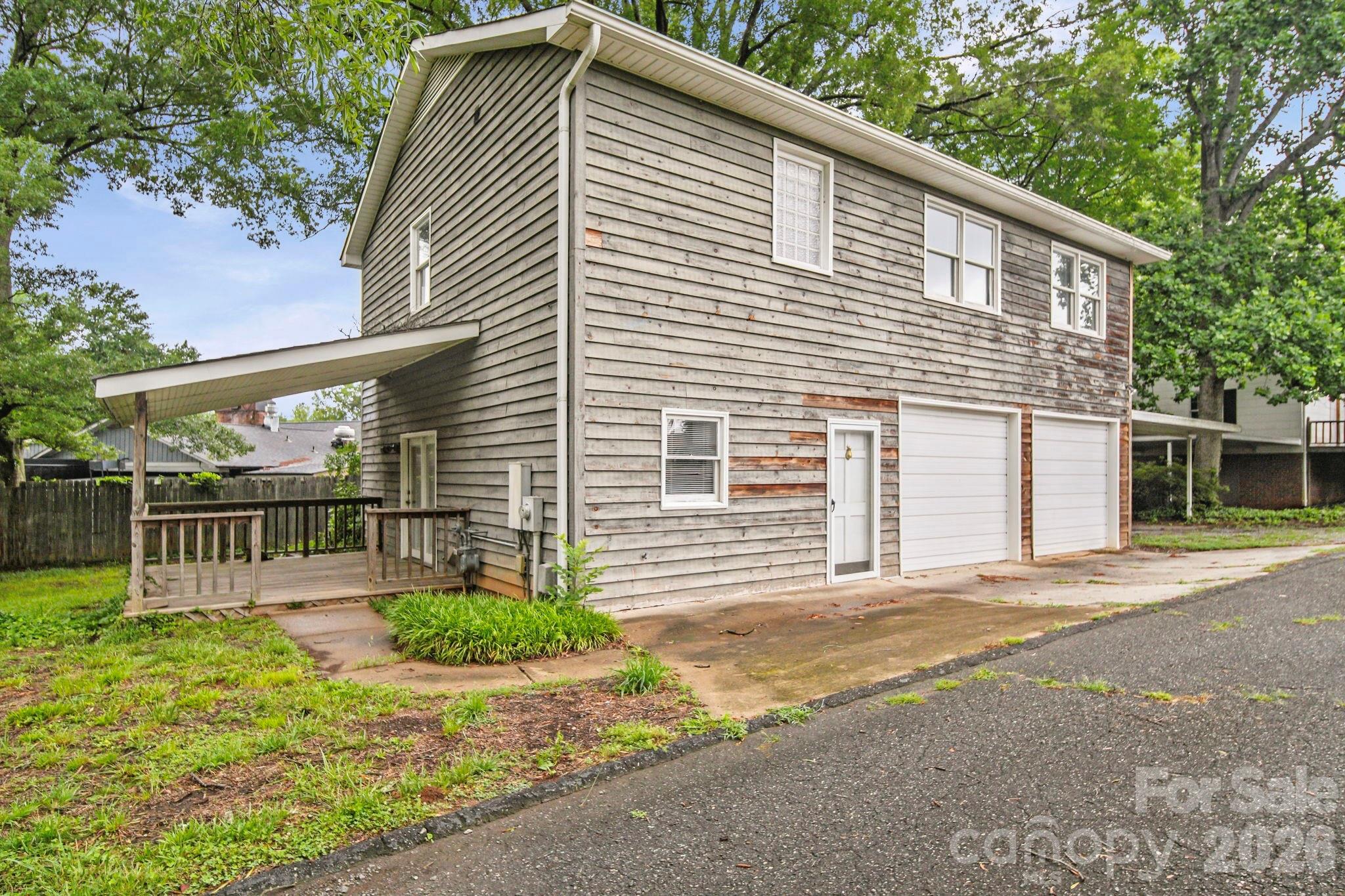 1109 Union Road Gastonia, NC 28054 - Photo 23 of 44 a front view of a house with garden