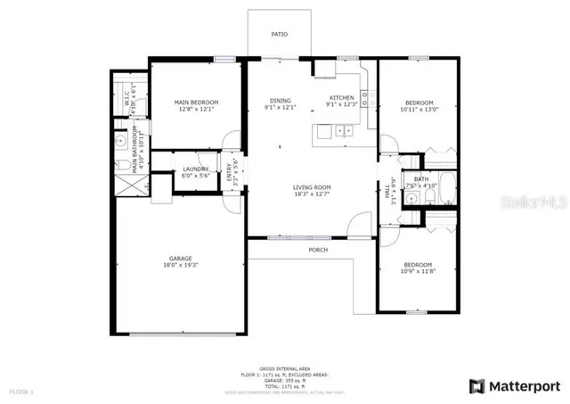 an empty room with wooden floor ceiling fan and windows