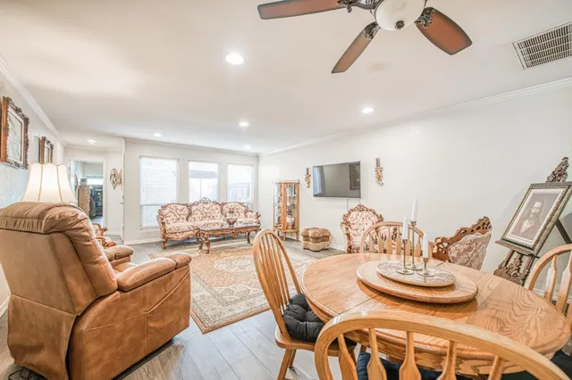 a view of a dining room with furniture
