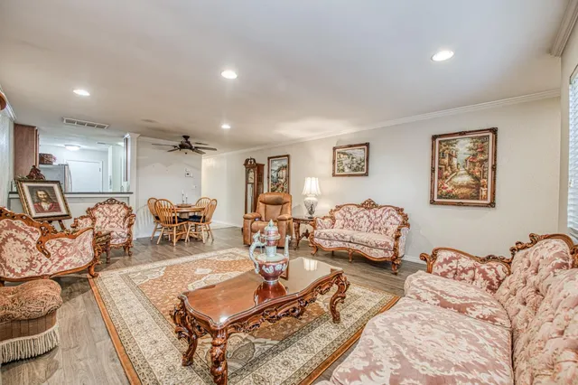 a living room with furniture and a couch