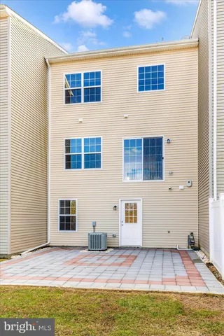 a view of a terrace with sitting area