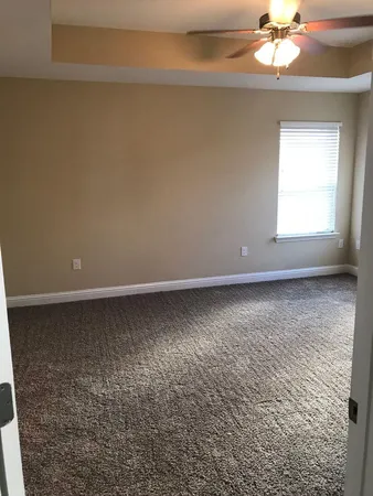a view of a room with a window