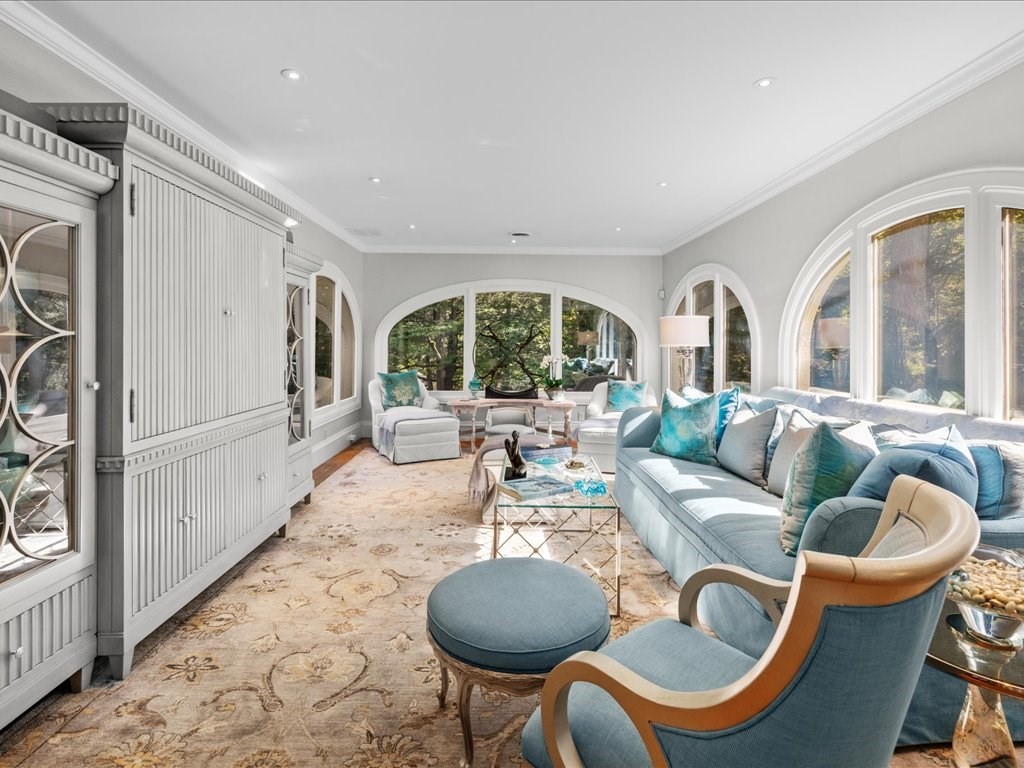 142 Crafts Road Brookline, MA 02467 - Photo 11 of 42 a living room with furniture a table and a large window