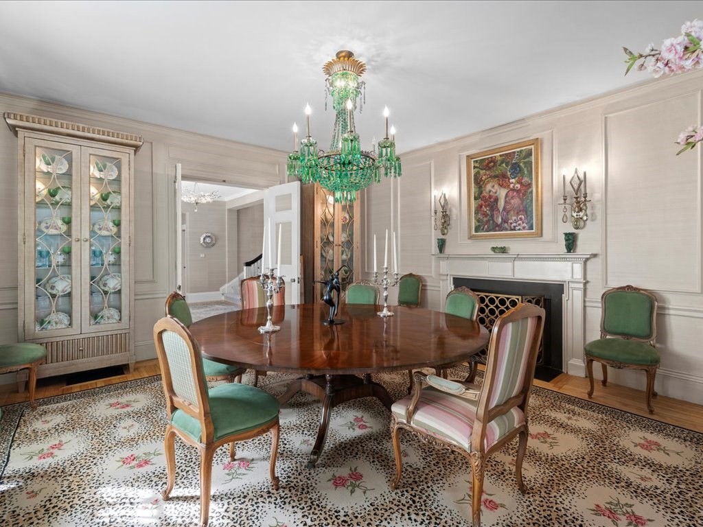142 Crafts Road Brookline, MA 02467 - Photo 14 of 42 a dining room with furniture a livingroom and chandelier