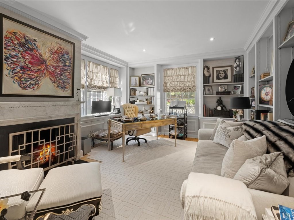 142 Crafts Road Brookline, MA 02467 - Photo 15 of 42 a living room with furniture ceiling fan and a window