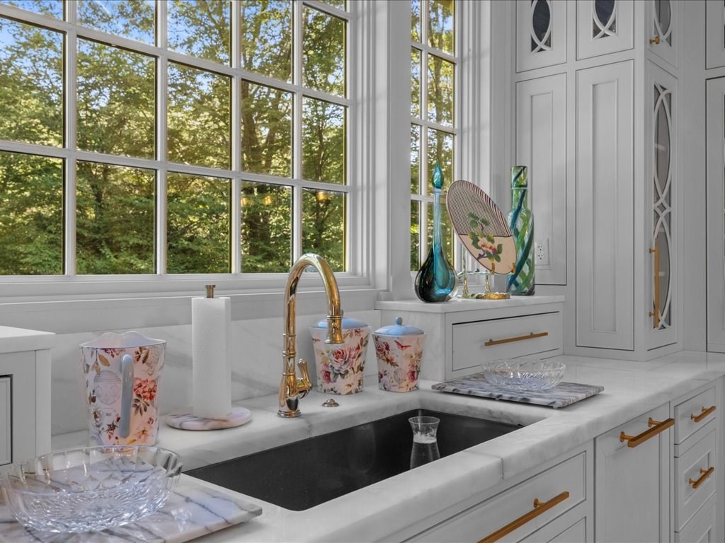 142 Crafts Road Brookline, MA 02467 - Photo 6 of 42 a kitchen with a sink and a large window