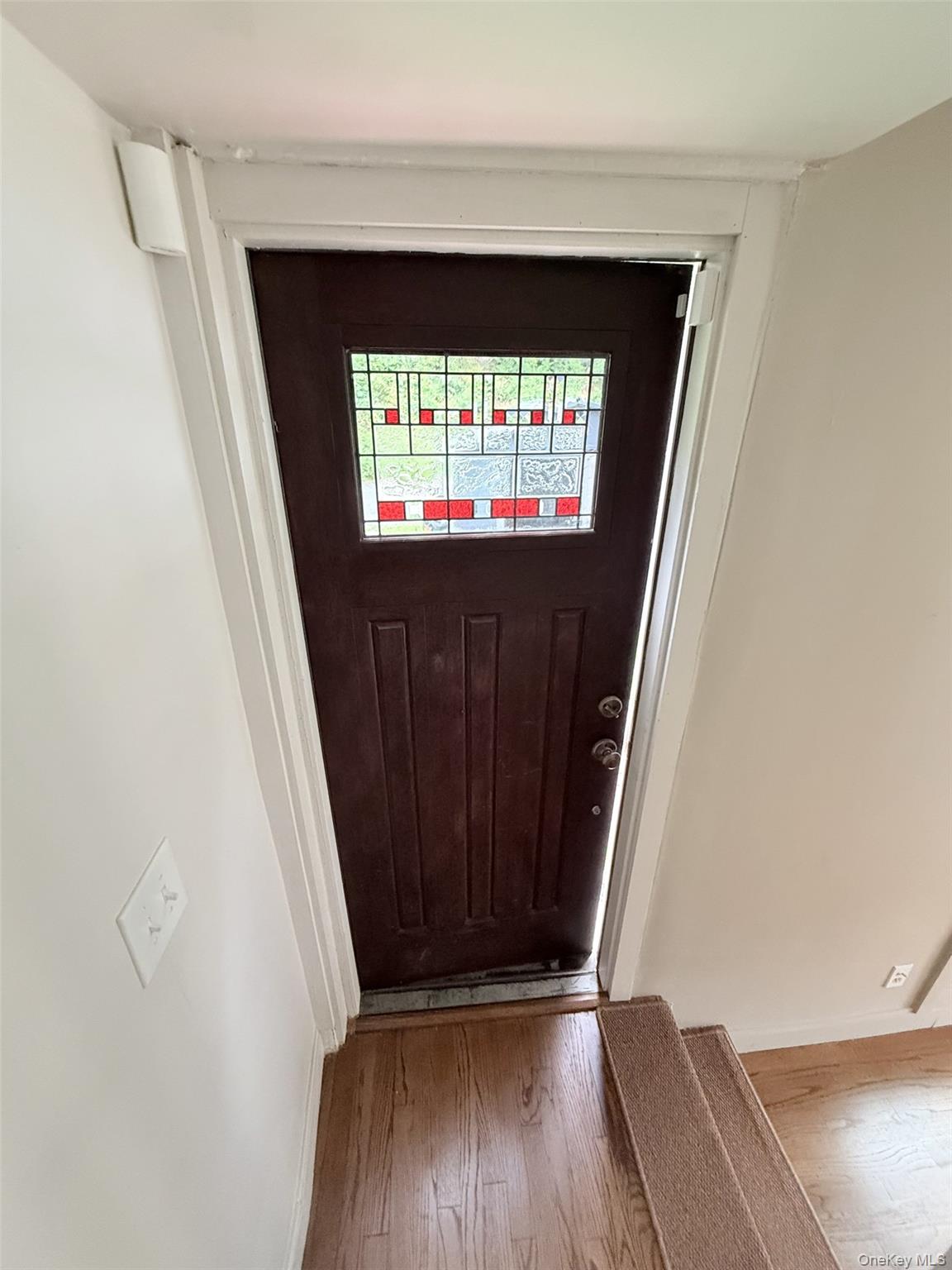 4 Lower Trinity Pass Road Pound Ridge, NY 10576 - Photo 3 of 29 a view of entryway with wooden floor
