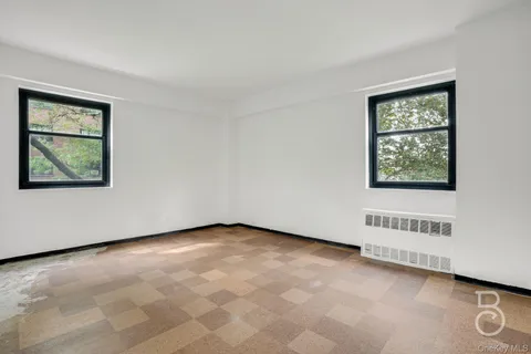 an empty room with windows