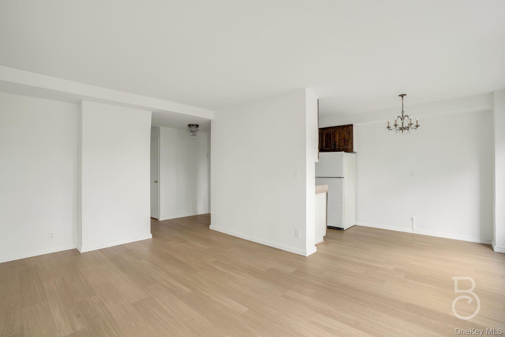 33-43 14th Street, Unit 4B Queens, NY 11106 - Photo 10 of 19 an empty room with a empty space and a hallway