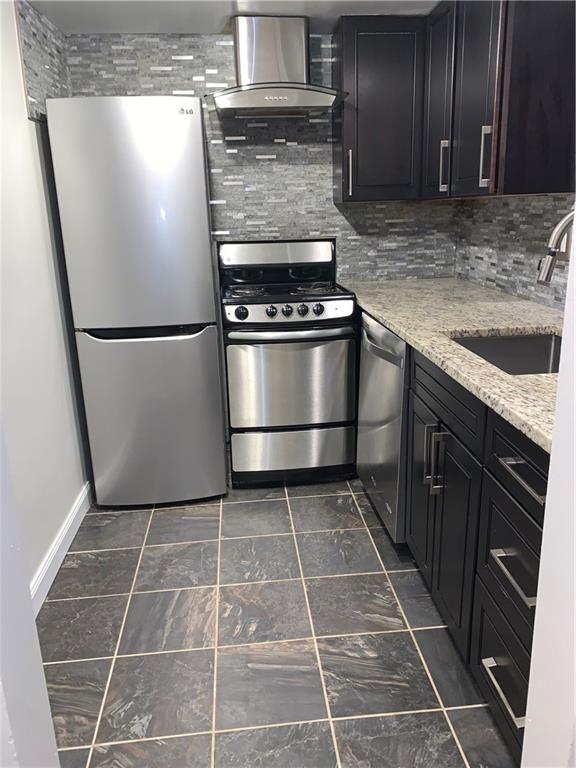 5708 Walnut Street, Unit G1 Pittsburgh, PA 15232 - Photo 4 of 19 Nicely modernized kitchen with stainless appliances, and open view to living/dining area